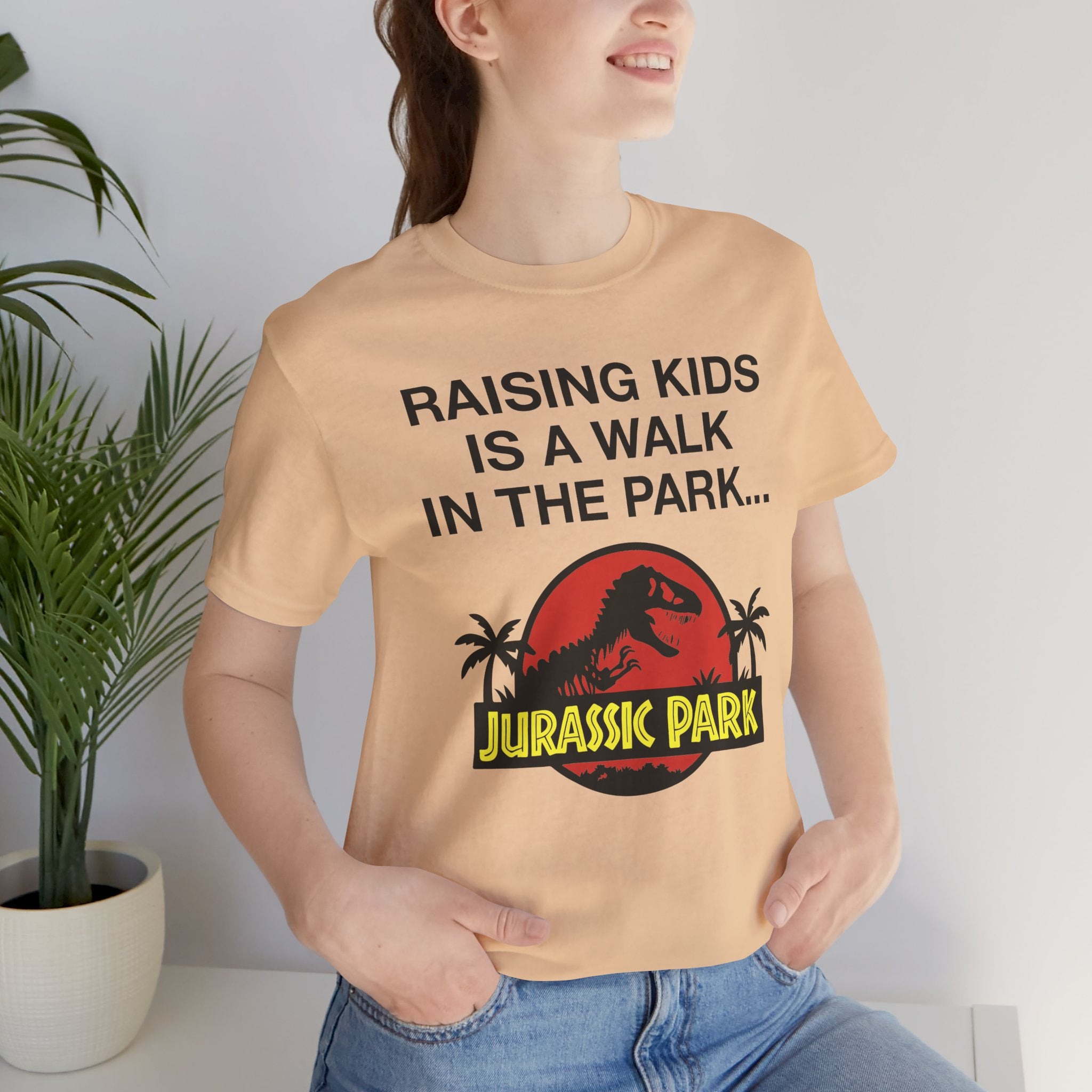 “Raising Kids Is a Walk in the Park… Jurassic Park” Funny Parenting T-Shirt